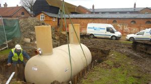Interlocking ground shoring is used due to the depth of excavation and unstable ground conditions.
