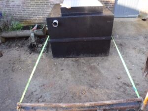 Grease trap installation for a refitted commercial catering unit