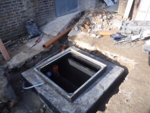 Grease trap installation for a refitted commercial catering unit