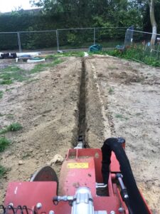 Cable laying on site with our own ditch