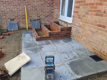 new backdoor step constructed with small patio